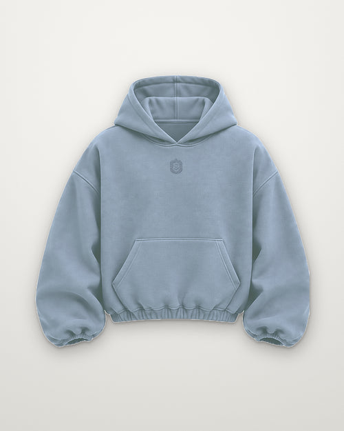 SAUVRIM Red Sun Crane hoodie in dusty blue, front, small tonal crest